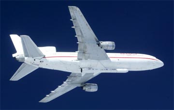 The Pegasus launch vehicle is carried under an Orbital airplane.